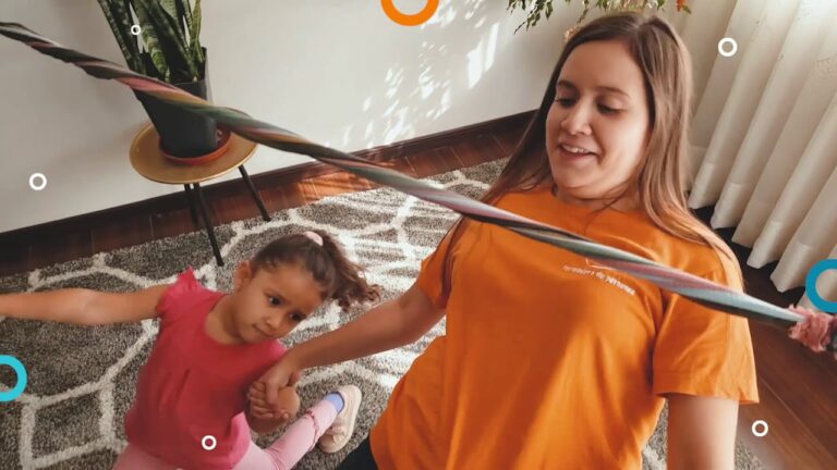 Baile pasando debajo de un palo